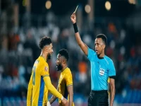 عاجل: إدارة ترامب تقطع مسيرة عرتن… أمريكا تحرم الحكم الصومالي من قيادة مونديال 2026 بعد تفتيش روتيني